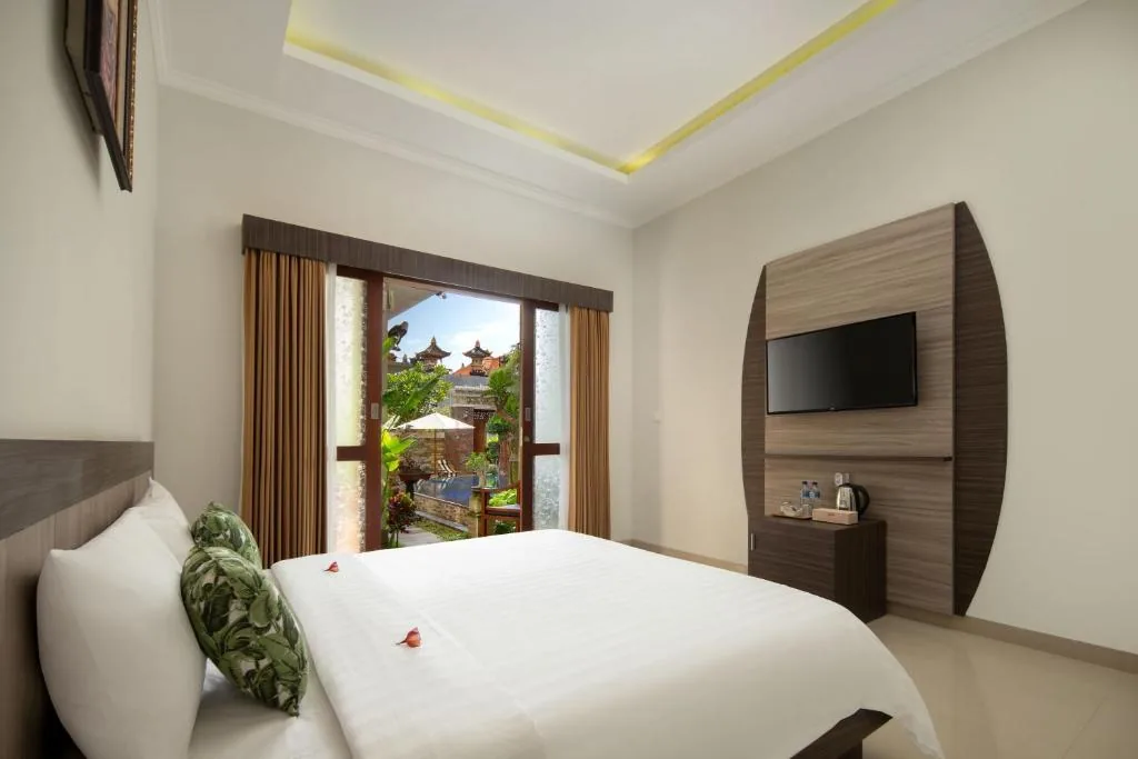 King Room with Pool View — Jineswari Kuta